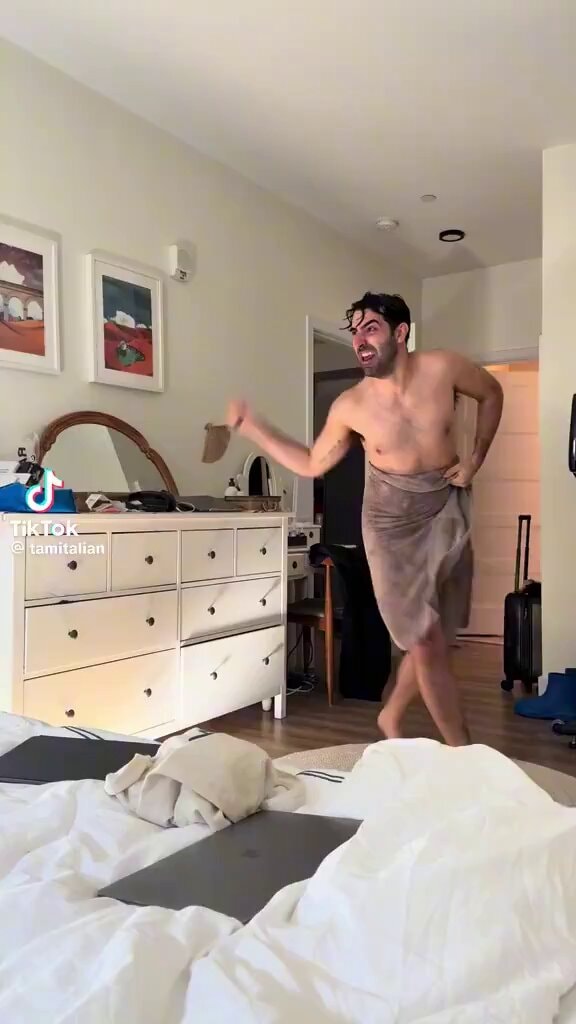 Shirtless man towel dance bedroom 😂