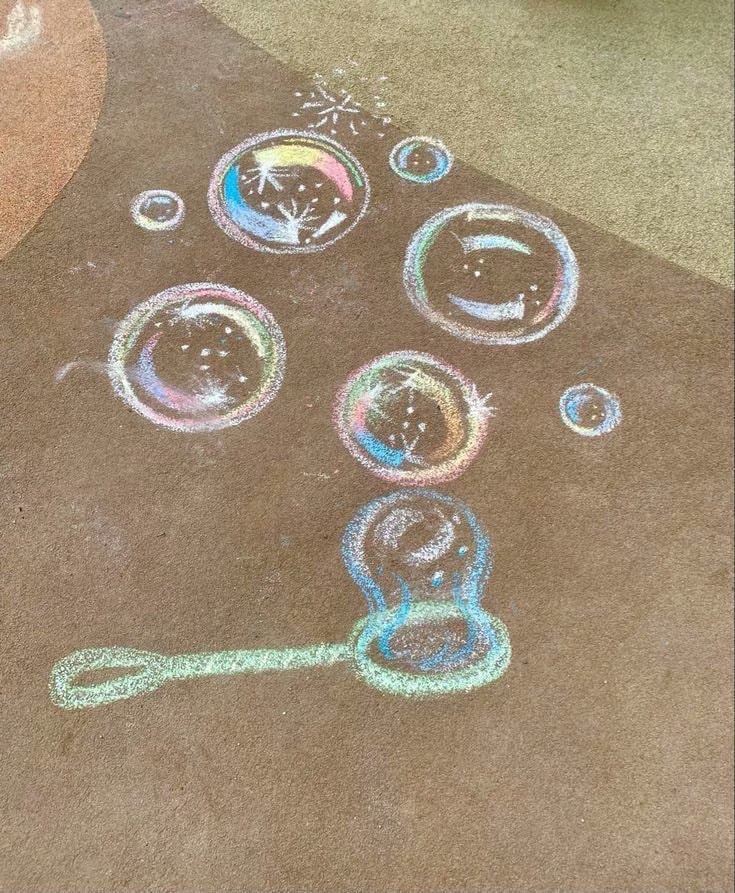 rainbow bubble chalk art on road (photo 2 of 2)