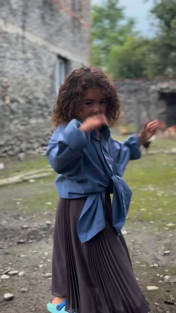 curly hair girl dancing