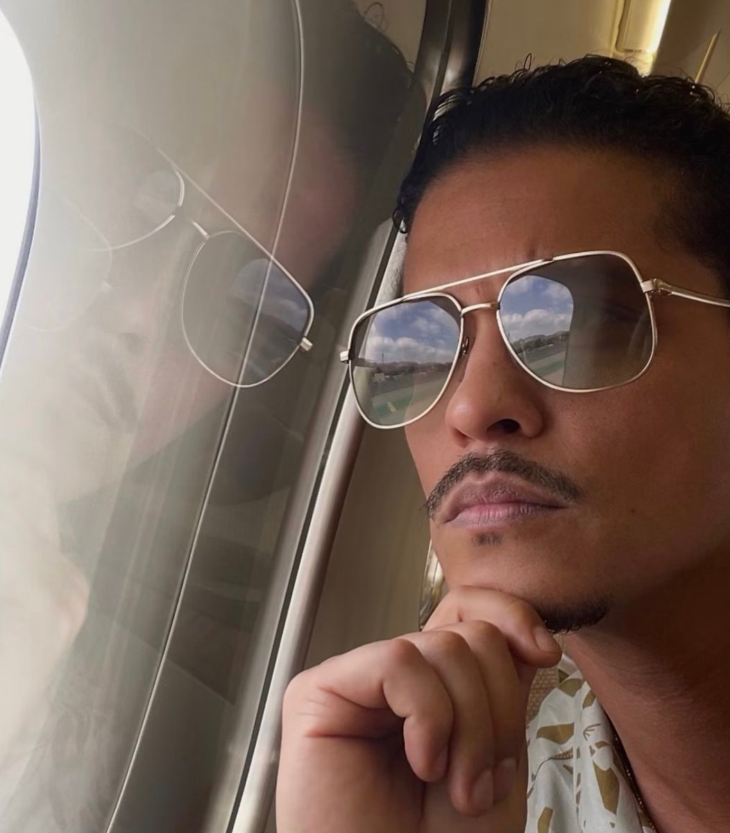 Bruno Mars reacts to Drake and KAROL G