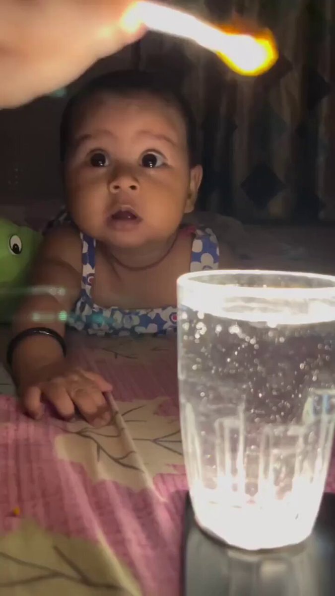 Baby discovers something new