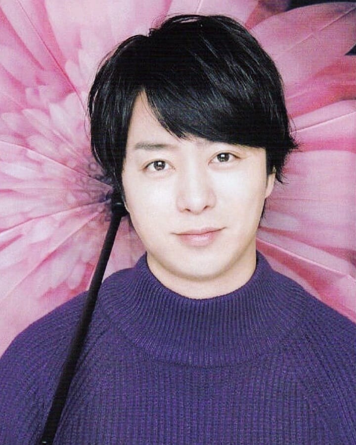 Sho Sakurai umbrella portrait (photo 3 of 4)