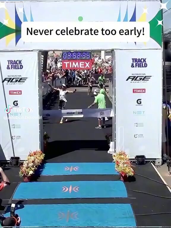 runner crossing finish line