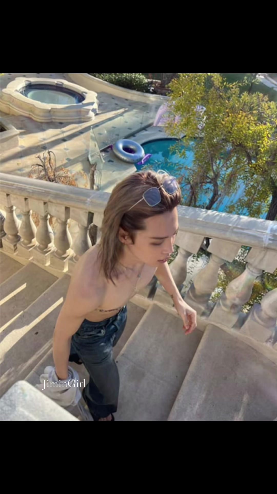Jimin walking down stairs
