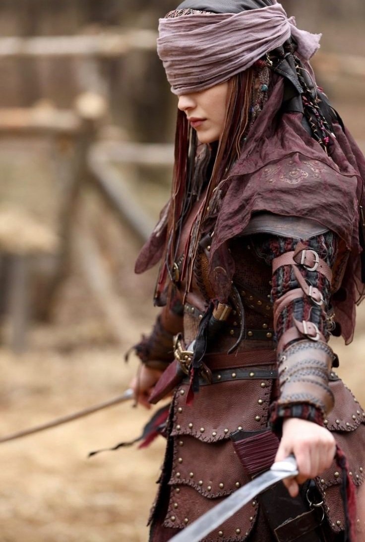Warrior woman with sword action scene (photo 2 of 3)
