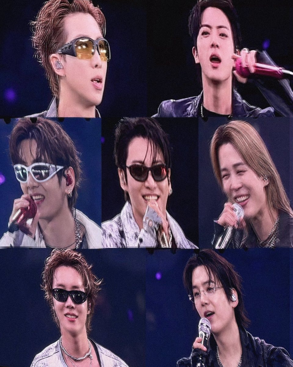 seven kpop idols performing