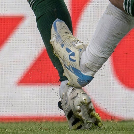 World Cup 2 pictures Messi tackle (photo 2 of 2)