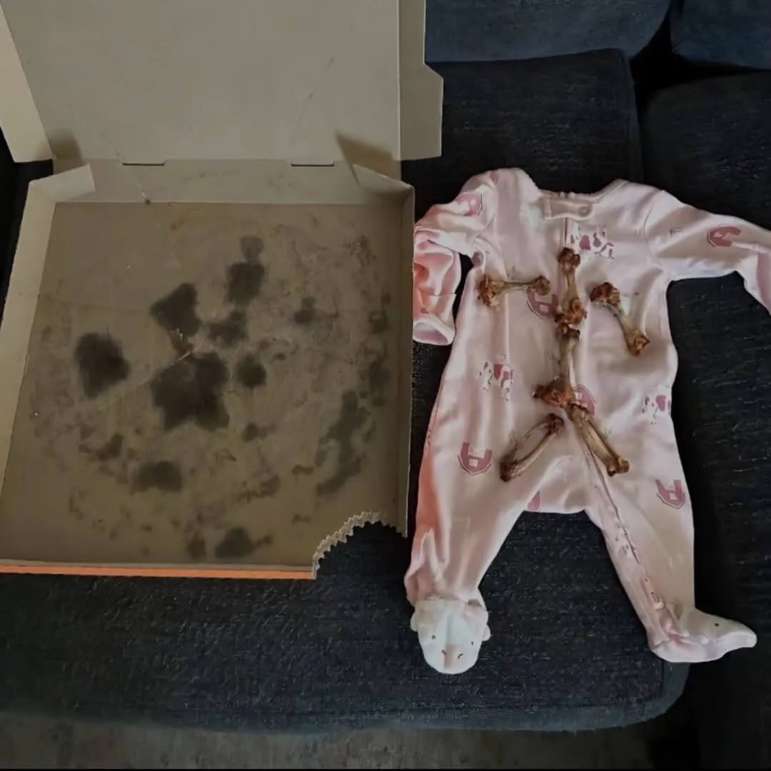 baby sleeping next to pizza (photo 2 of 2)