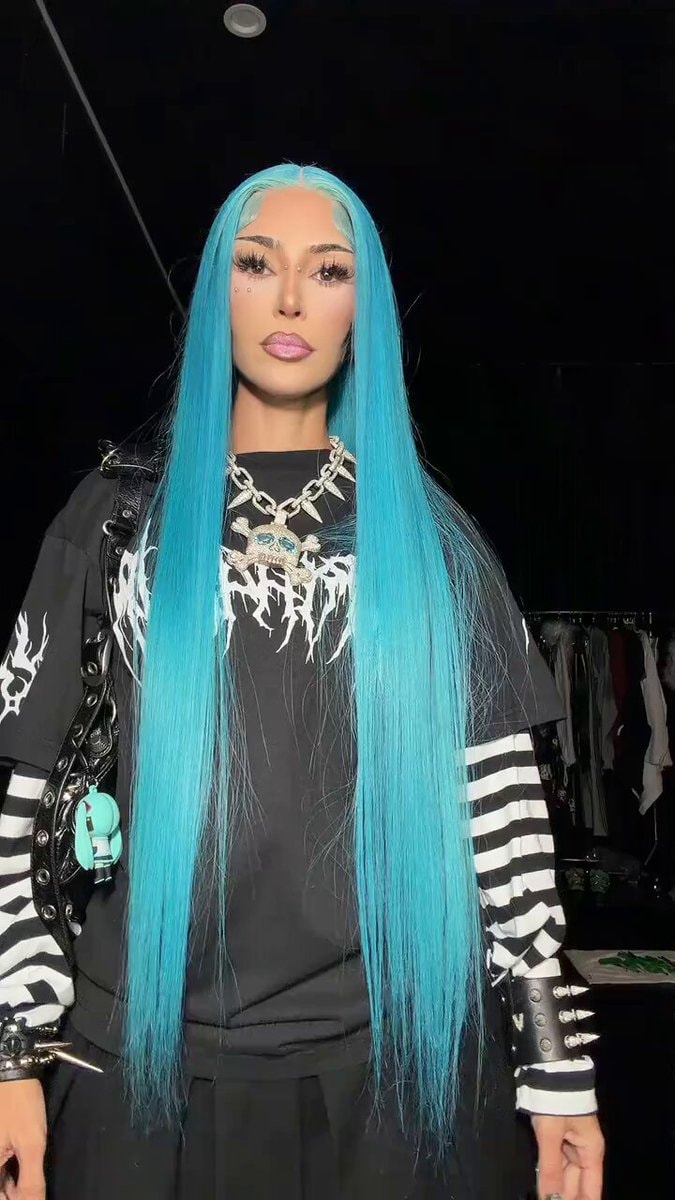 Kim Kardashian dressed as North West