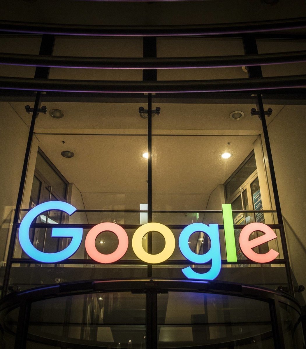Google logo illuminated at night