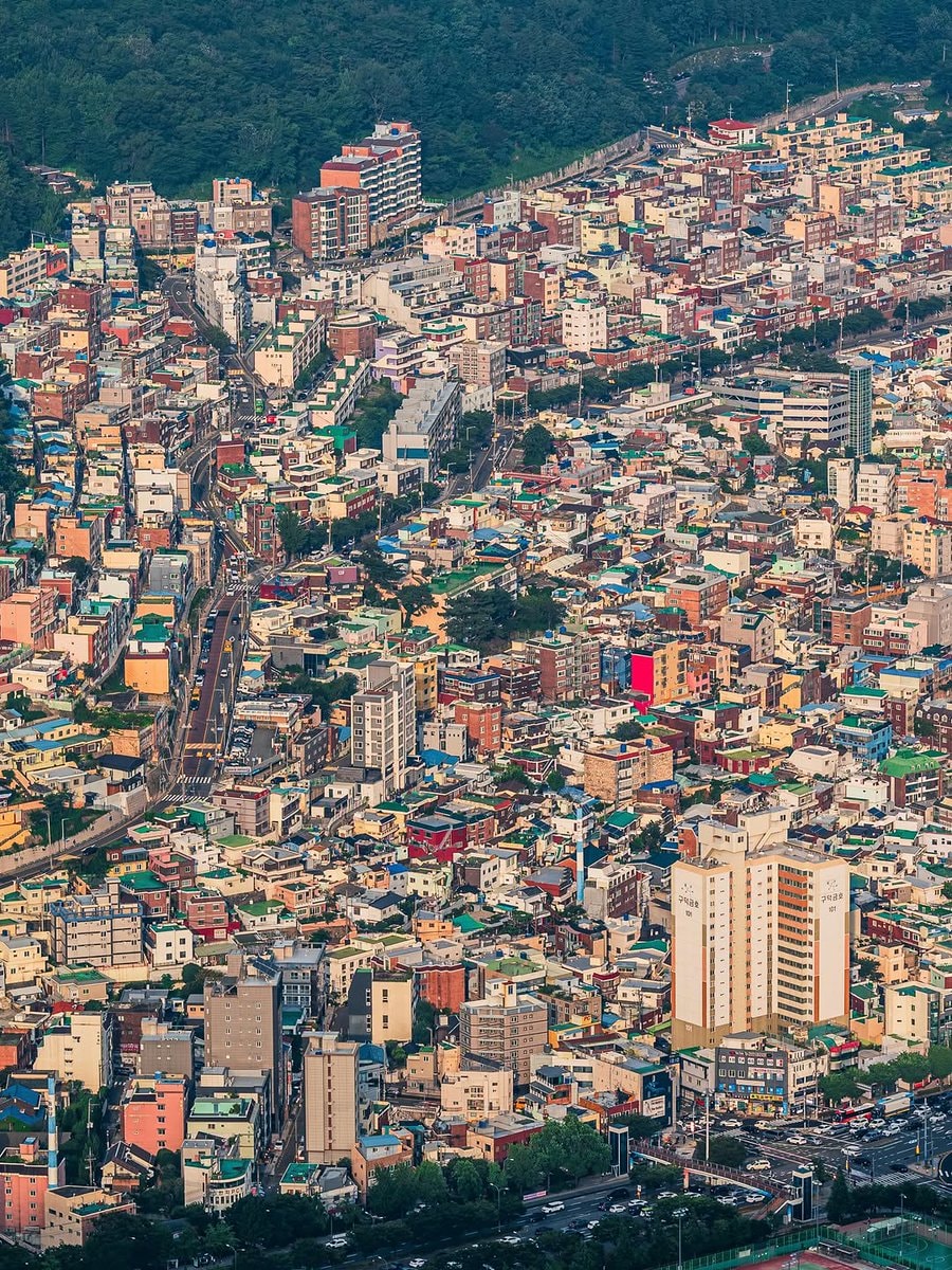 Aerial view of city with stadium and water (photo 3 of 3)