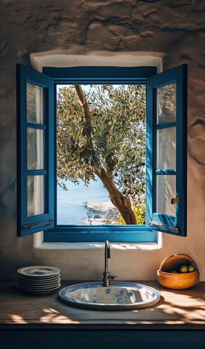 Rustic doorway scene with sea view (photo 2 of 2)