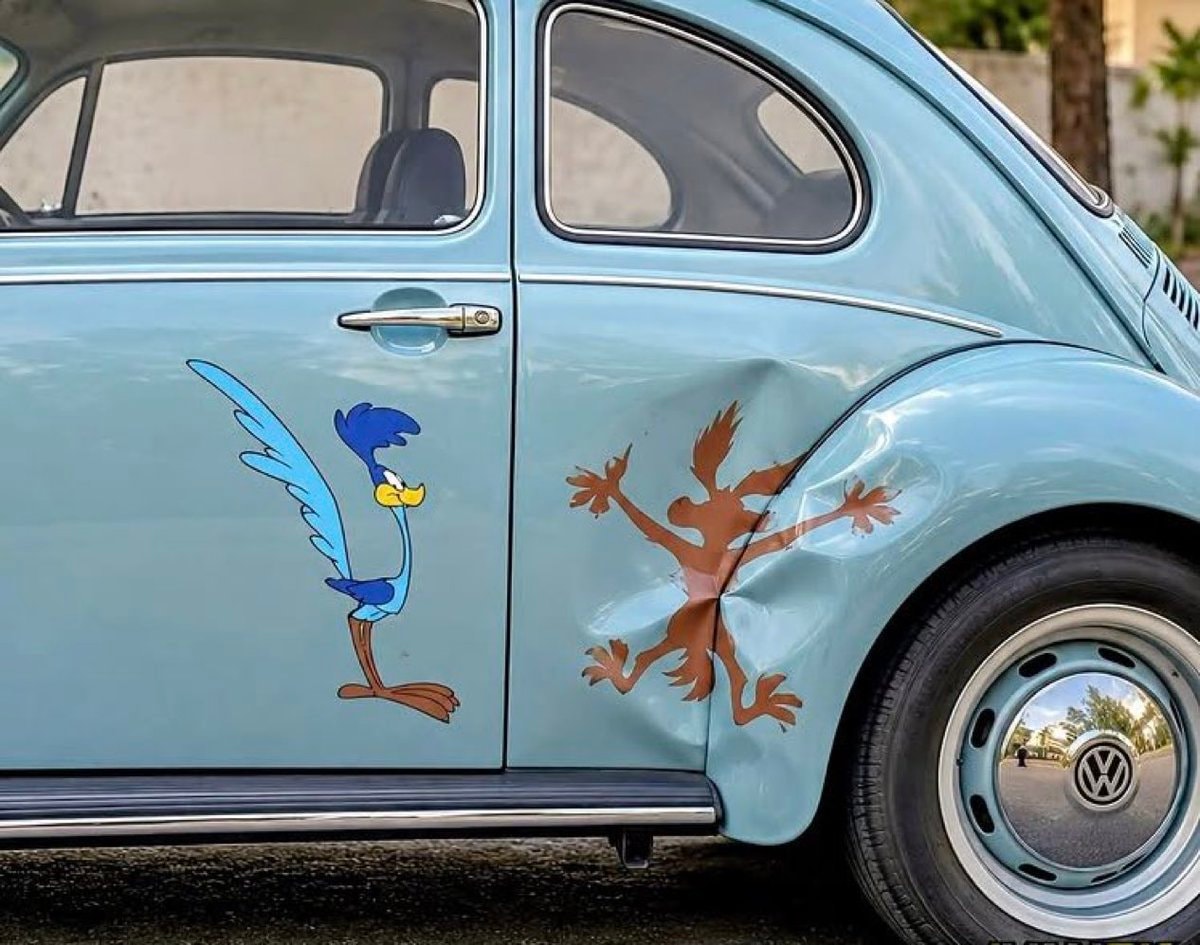 Volkswagen Beetle with Road Runner and Wile E. Coyote decals Volkswagen Beetle with Road Runner and Wile E. Coyote decals