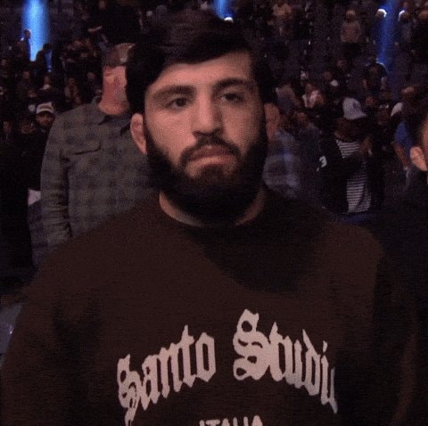 Man in Santo Studio sweatshirt