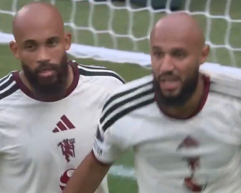 Two men in Manchester United kits