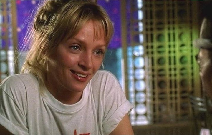 blonde woman in white t-shirt