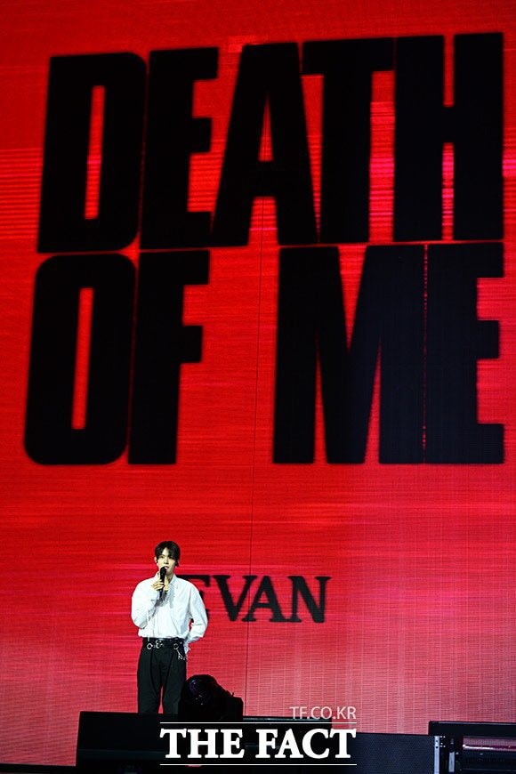 EVAN stage performance with white shirt (photo 2 of 2)