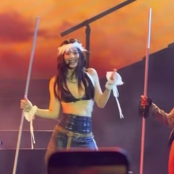 Jennie Kim stage performance with streamers
