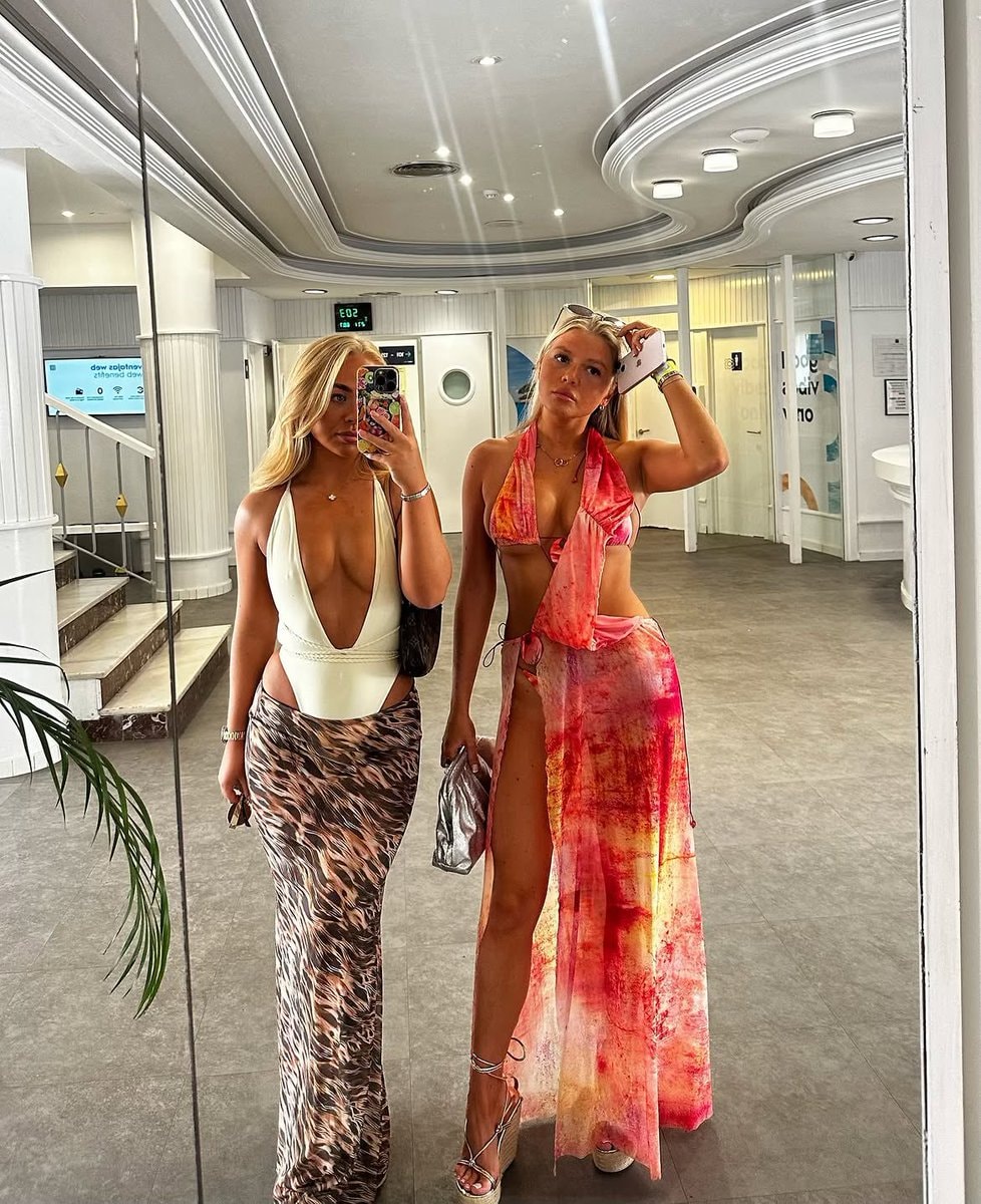 two women mirror selfie two women mirror selfie
