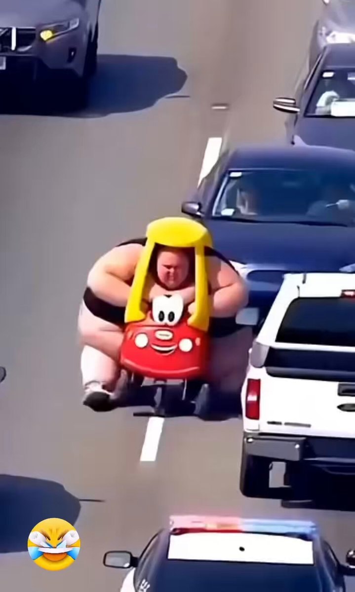 man in toy car pursuit 405