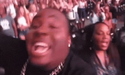 man laughing excitedly