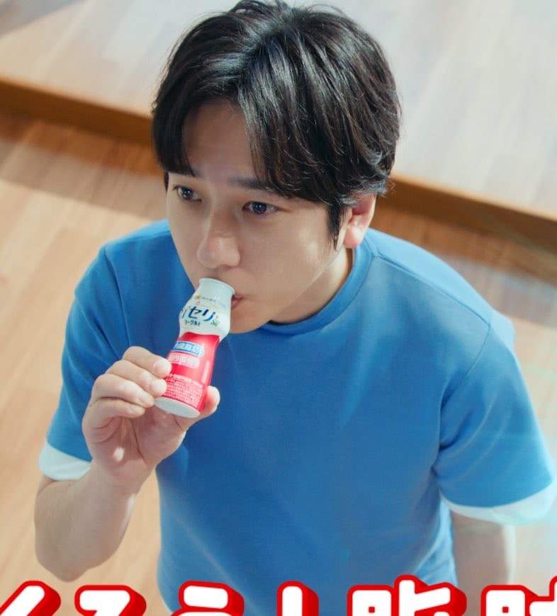 Drinking from a tiny bottle Drinking from a tiny bottle