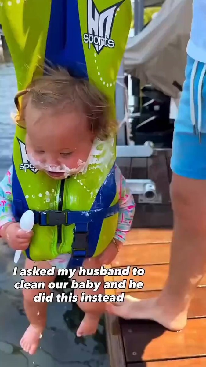 Dad and baby with whipped cream on dock