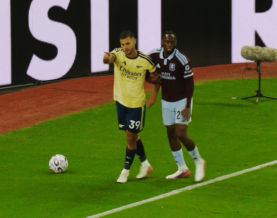 soccer player walking on field