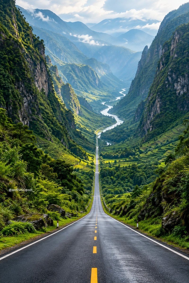 winding road through green mountains winding road through green mountains
