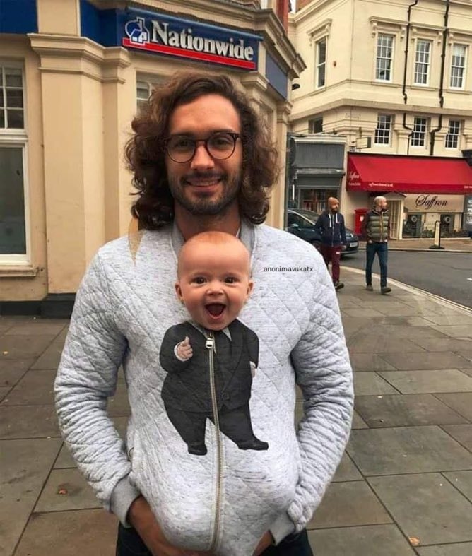 Dad and baby thumbs up