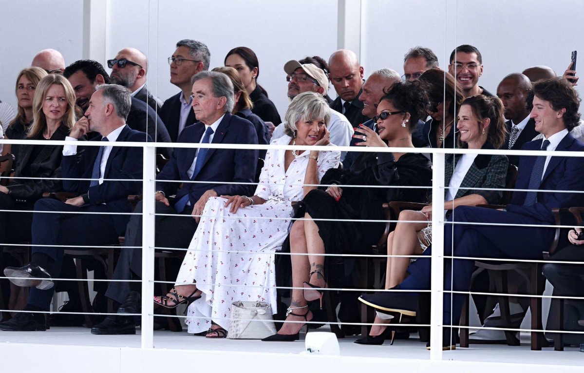 Rihanna at Dior SS27 with Arnault family