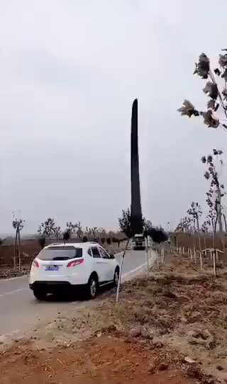 SUV in ditch monument