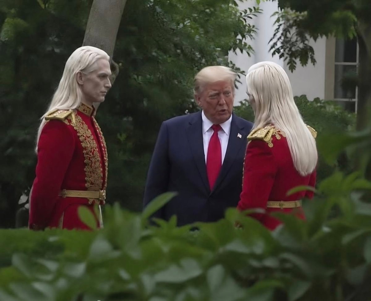 Trump with two unidentified men in red uniforms