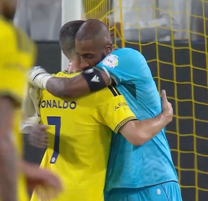 Waleed Abdullah soccer embrace