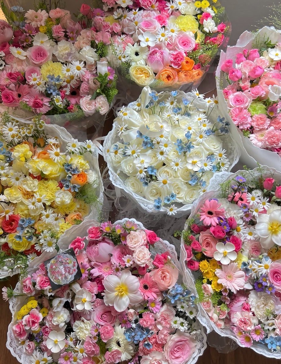 Six colorful floral bouquets with lace trim