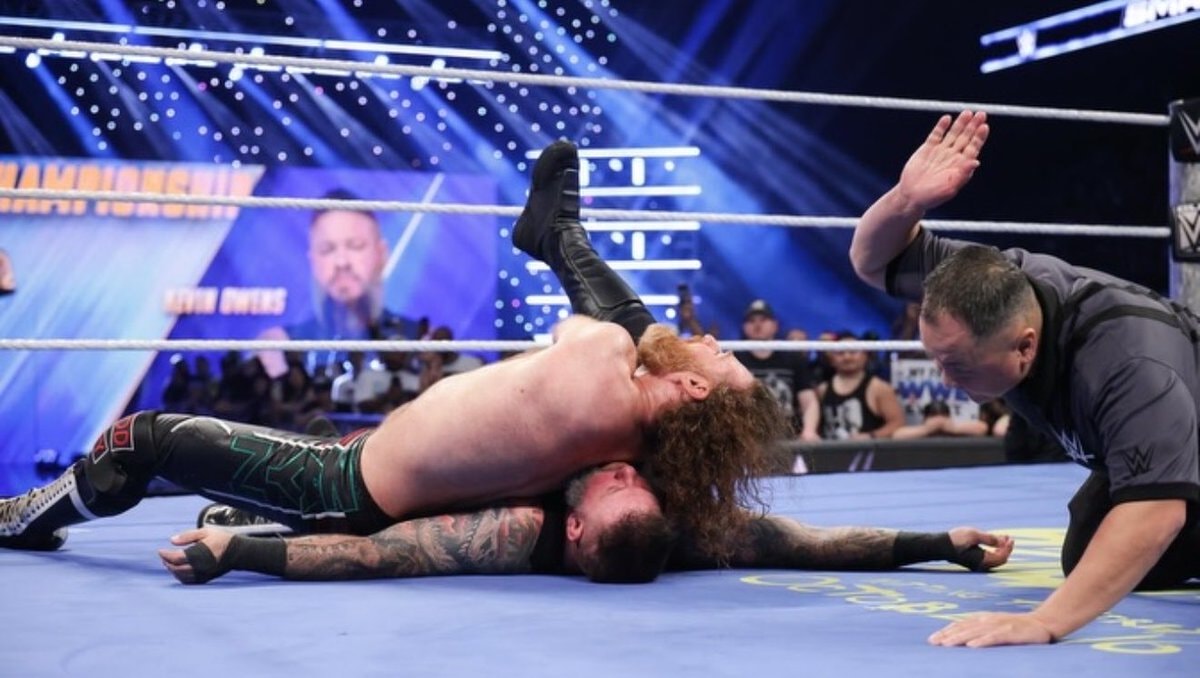 Kevin Owens vs Sami Zayn belt shot