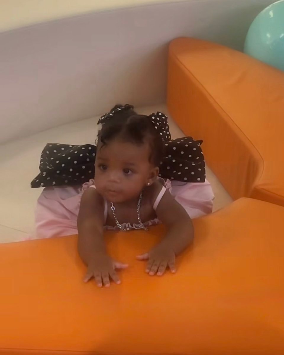baby girl in pink dress