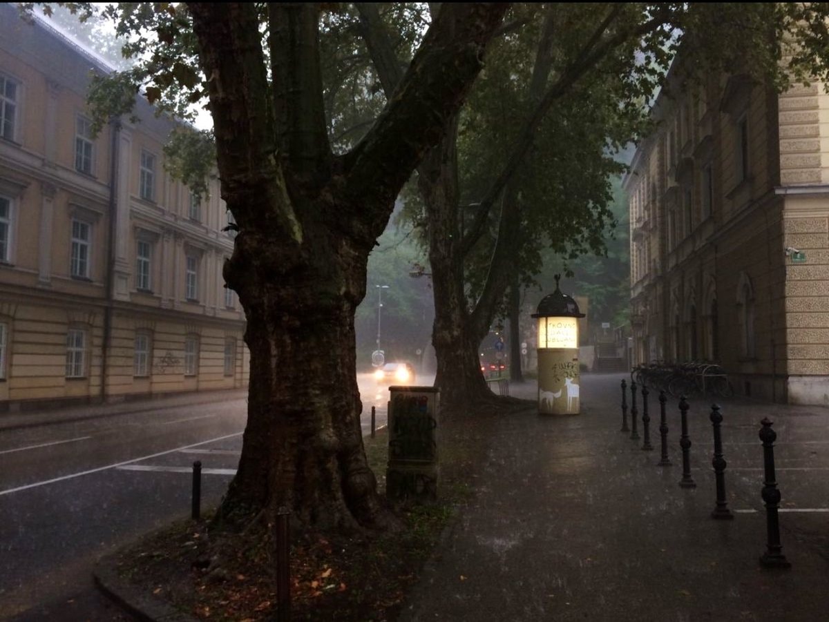 Rainy street scene in heavy rain (photo 2 of 2)