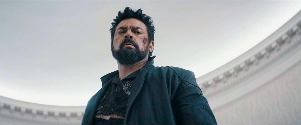 Bearded man with blood on face