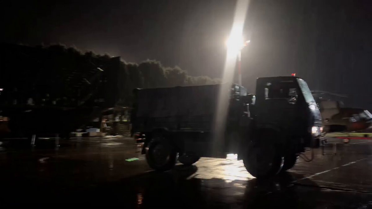 Nepalese Army relief trucks