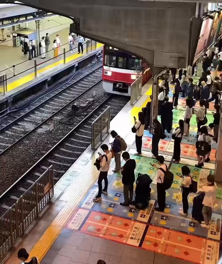 Japan train boarding calm orderly