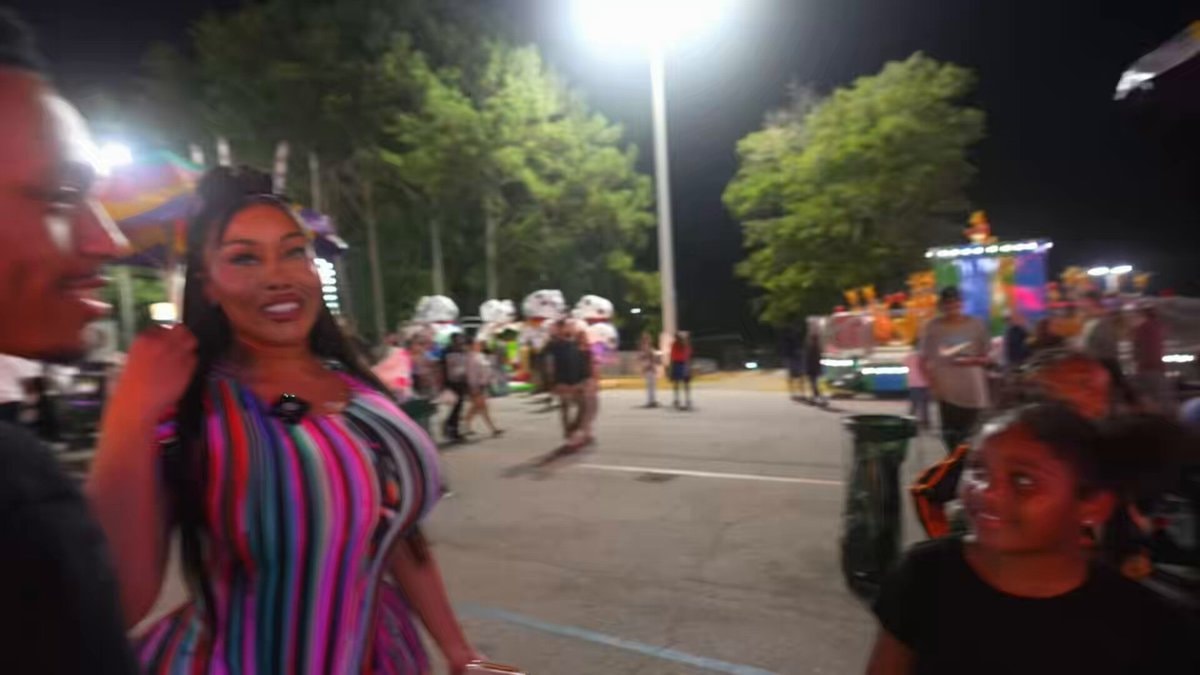 Moriah Mills at the fair with Trey J
