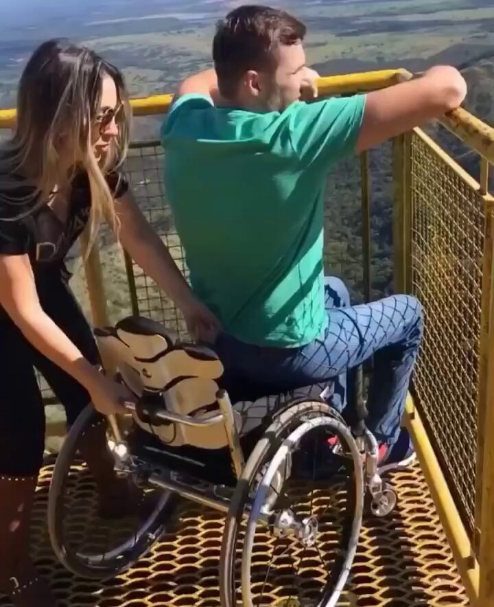 Wife helps husband see the view ❤️