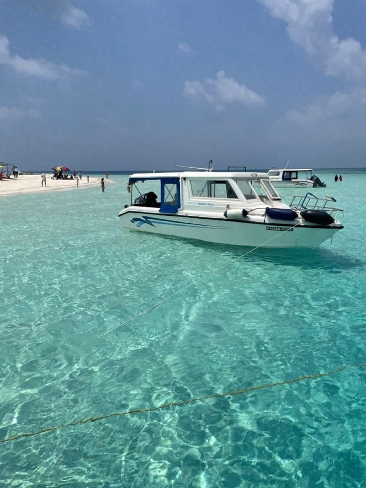 Sardegna boat in turquoise water