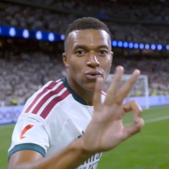 soccer player in white jersey