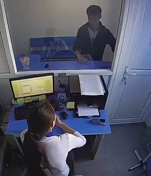 security camera view of counter interaction