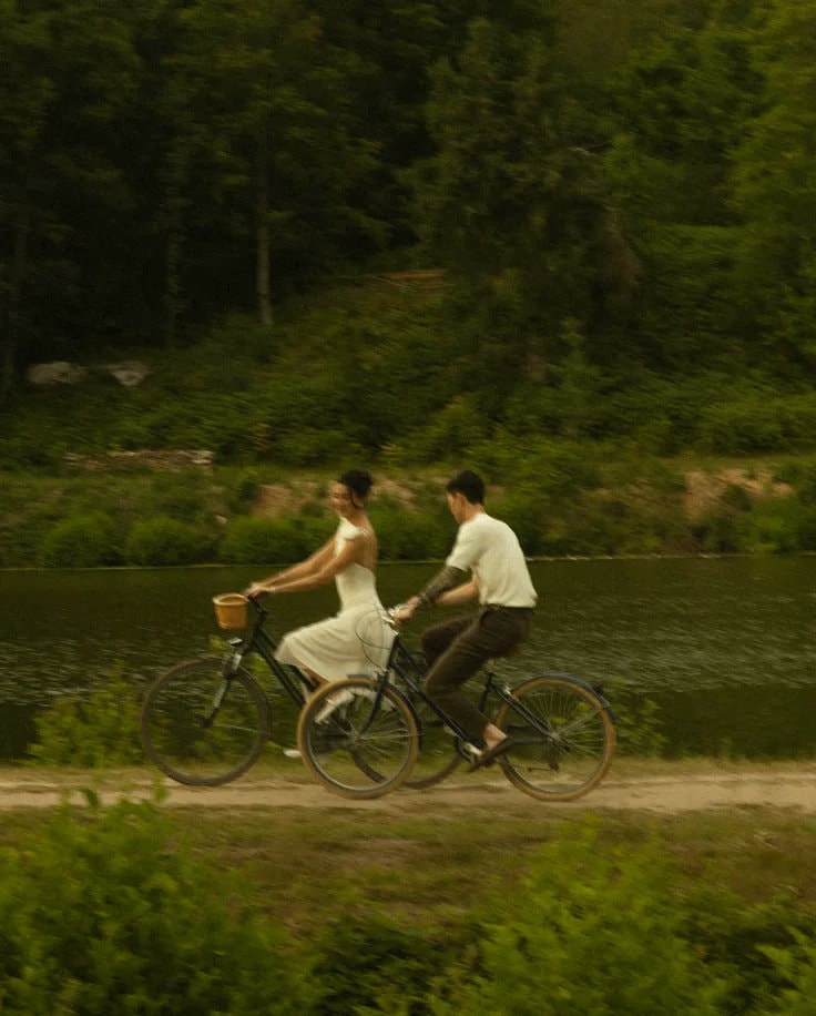 Couple in white on grass (photo 2 of 4)