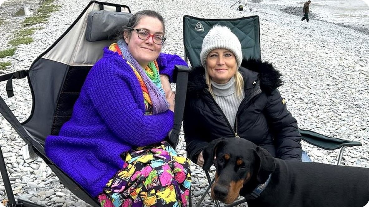 Woman and Doberman Pinscher in Wales