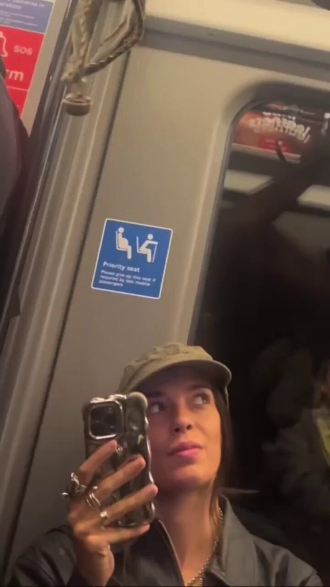 young woman train selfie