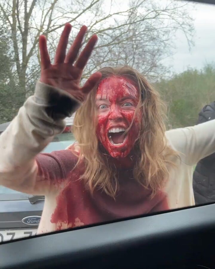 screaming scene with Ford logo